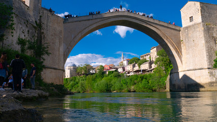 Mostar / Bosnia & Herzegovina - April 2019: People Mostar Bridge (Stari Most). Old Mostar Bridge...