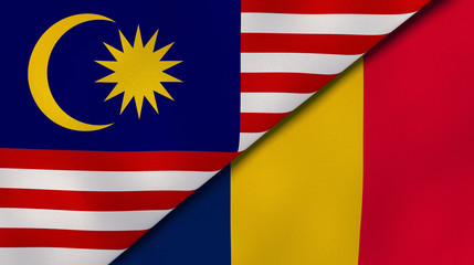 The flags of Malaysia and Chad. News, reportage, business background. 3d illustration