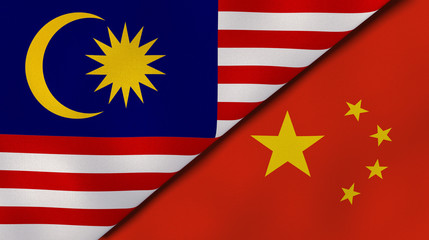 The flags of Malaysia and China. News, reportage, business background. 3d illustration