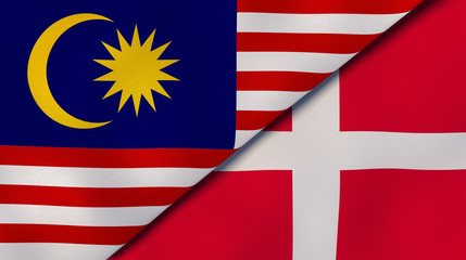 The flags of Malaysia and Denmark. News, reportage, business background. 3d illustration