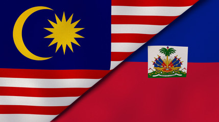 The flags of Malaysia and Haiti. News, reportage, business background. 3d illustration