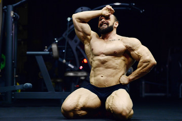 Bodybuilder athletic man workout muscles exercise