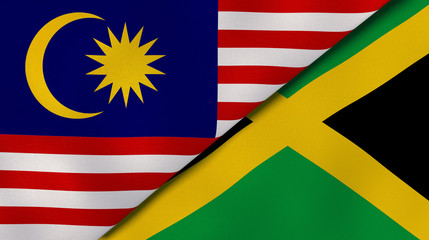 The flags of Malaysia and Jamaica. News, reportage, business background. 3d illustration