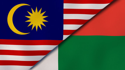 The flags of Malaysia and Madagascar. News, reportage, business background. 3d illustration