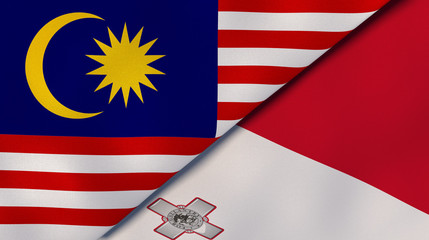 The flags of Malaysia and Malta. News, reportage, business background. 3d illustration