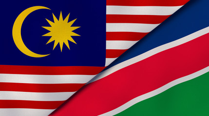 The flags of Malaysia and Namibia. News, reportage, business background. 3d illustration