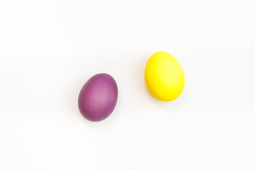Easter multicolor eggs isolated on a white background. Rainbow. Copy space. Flat lay. Top view.