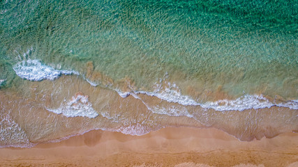 Fototapeta na wymiar Aerial Picture of Turquoise Water and Beach