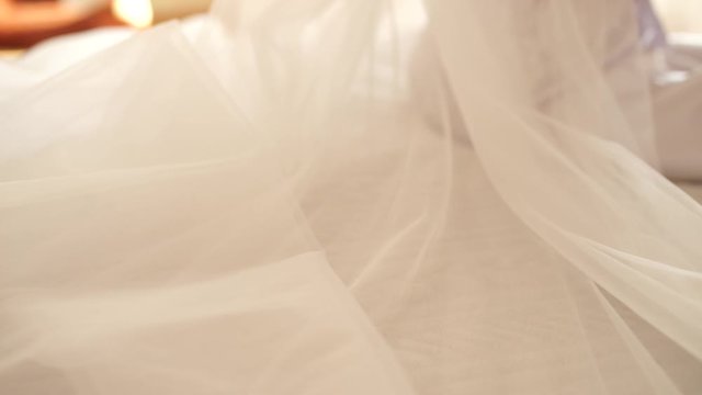 veil of the bride on the bed