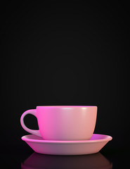 Pink mug and saucer on a dark background.