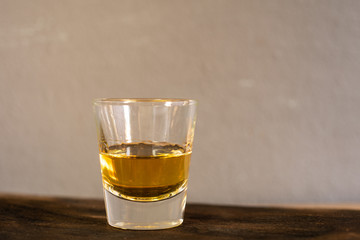 Whiskey one shot in a cup.