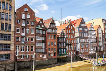 Hamburg, Germany : historic buildings on bank of Nikolaifleet canal on clear summer day