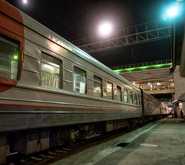 Passenger train on the railway. Railway transport.