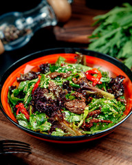 meat salad with vegetables on the table