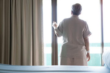 Hospital quarantine room, Quarantine patient in treatment of COVID-19 Pandemic Coronavirus Woman hospital isolation with Dripping of IV solution in alone, Coronavirus Disease 2019 spreading concept