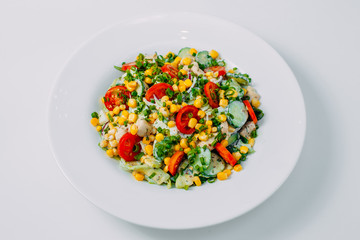 sweet corn, tomato and chicken salad, healthy food isolated on white background
