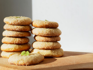 Sugar cookies on a wooden background. Copyspace on the right.