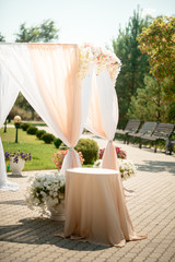 Wedding registration arch decorated with flowers
