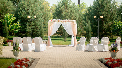 Wedding registration arch decorated with flowers
