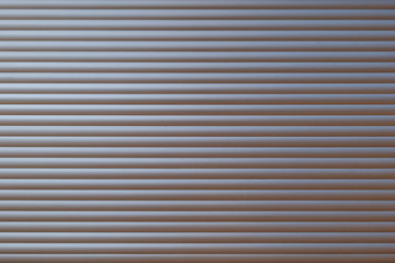 White metal with horizontal linear stripe pattern of rolling shutter door.