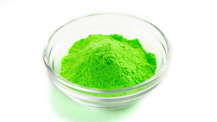 Green organic paint for Indian Holi celebration.