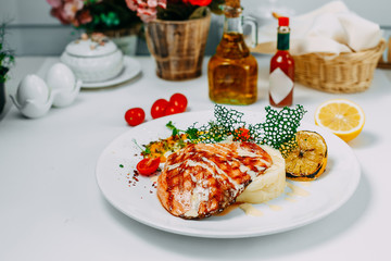 grilled chicken breast with mashed potatoes isolated on white background