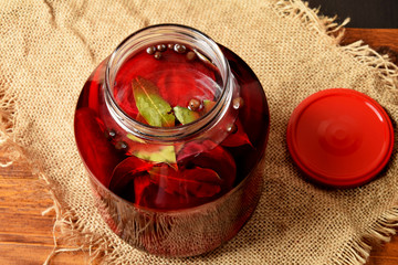one large jar full of beets with a screw cap