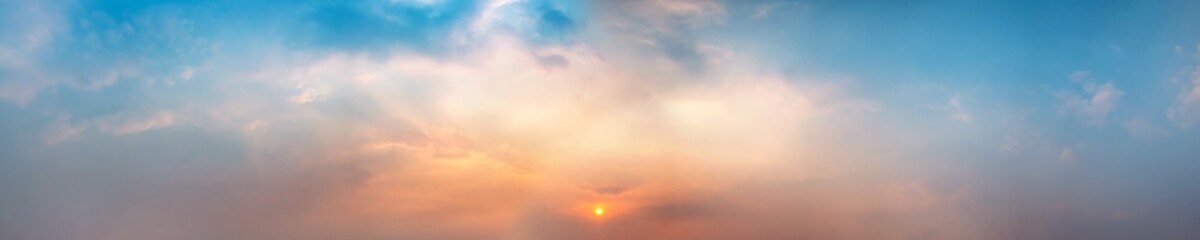 Panorama of Dramatic vibrant color with beautiful cloud of sunrise and sunset. Panoramic image.