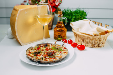 cheese casserole with vegetables, on a white background