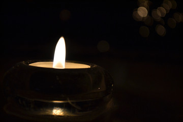 Candle flame close up on a black background