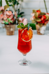 Beautifully decorated cocktail with a straw