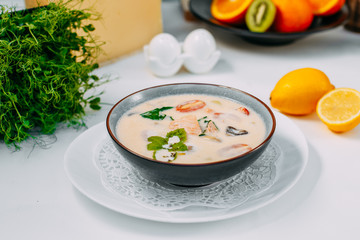 Russian dish fish soup, on a white background