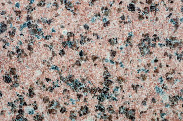 Red granite natural stone texture background material.