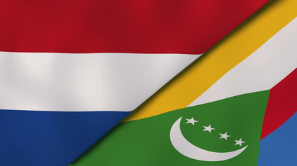 The flags of Netherlands and Comoros. News, reportage, business background. 3d illustration