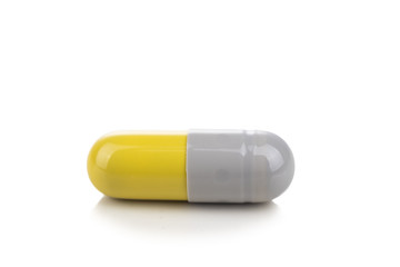 Close-up of medicine in capsule format on white background