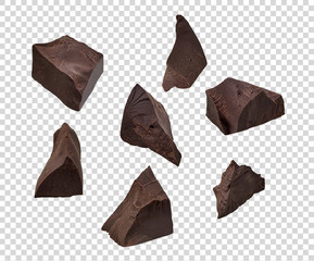 Cracked chocolates / broken chocolate chips or chocolate parts top view on isolated background including clipping path