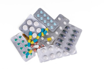 Overhead view of multiple strips of pills tablet, caplet, capsule. Medication for various disease.