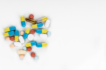 Obraz na płótnie Canvas Overhead view of multiple pills tablet, caplet, capsule. Medication for various disease.