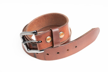 A formal studio product shot of a men’s used brown leather belt with patina set on plain white background.
