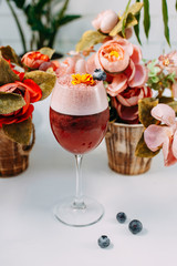 Beautifully decorated cocktail with a straw