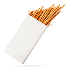 Crispy sweet straws in packaging on white background. Isolated