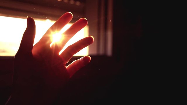 hand holding a red light