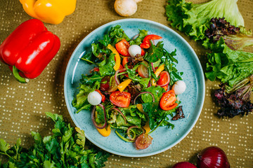 fresh vegetable salad, healthy food on a decorated table
