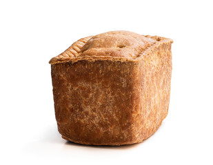 Traditional English savoury gala egg pork pie isolated on white