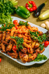 Assorted chicken, a dish for the company, on a decorated table