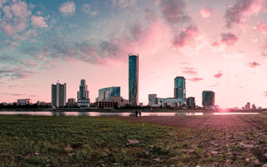 Panoramic view of Yekaterinburg City Center at sunset with a couple holding hands of each other