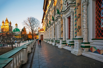 Fototapeta premium Carved columns and a large porch of the refectory overlooking the Church of the Nativity of John the Baptist. Trinity Lavra of St. Sergius. Sergiev Posad. Russia