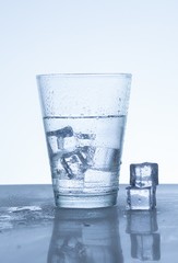 water to drink a glass with coldness Ice on a table isolated, drinking water purity refresh for healthcare,
beverage clean freshness to healthy,
liquid flow for thirst nature