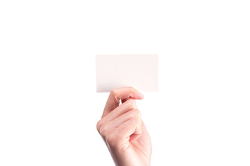 Fototapeta premium Hand Hold Blank White Card Mock-up. SIM Cellular Plastic NFC Smart Tag Call-card Mock Up Template. Credit Namecard or Transport Ticket. Christmas Store Discount Loyalty Gift. Copy space.