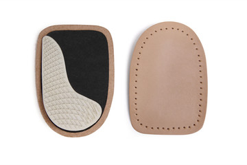 Orthopedic silicone heel pad from corns for the correction of different lengths of legs isolated on white background. Silicone insert for the forefoot. Insole. Silicone thumb protector with interdigit